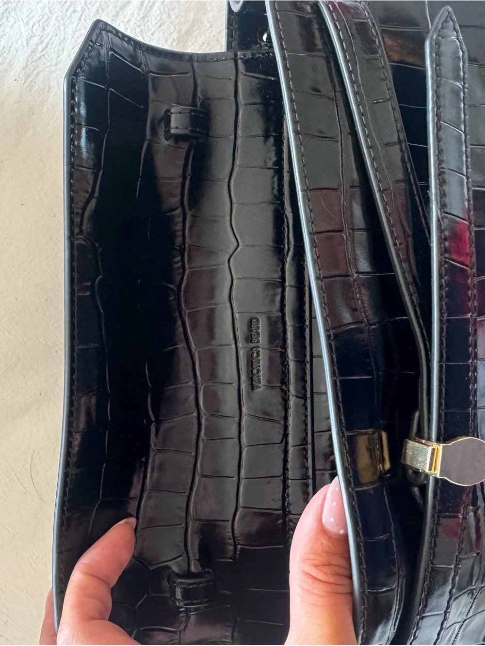 Veronica M Black Croc-Embossed Patent Leather Clutch with Gold Hardware